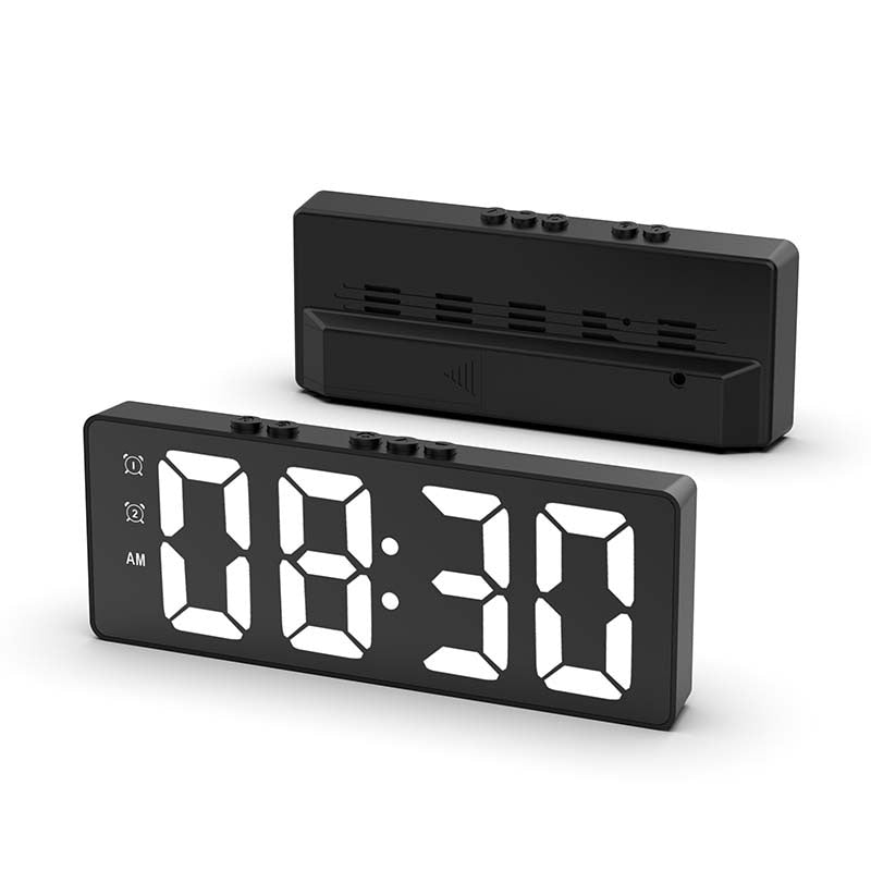 voice-controlled mirror clock with large LED HD display screen shows the time, temperature, and date. In black